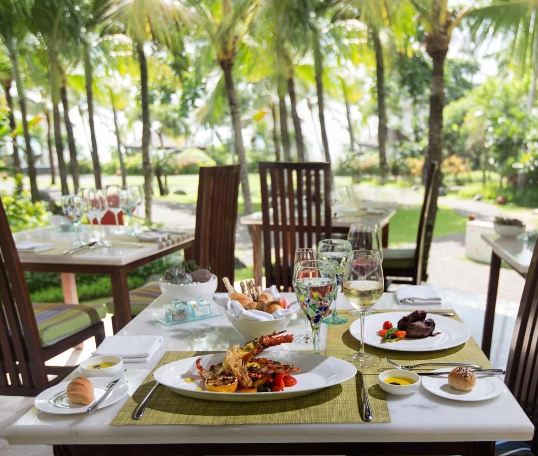 The Seminyak Beach Resort & Spa Eksteriør billede A table set for fine dining